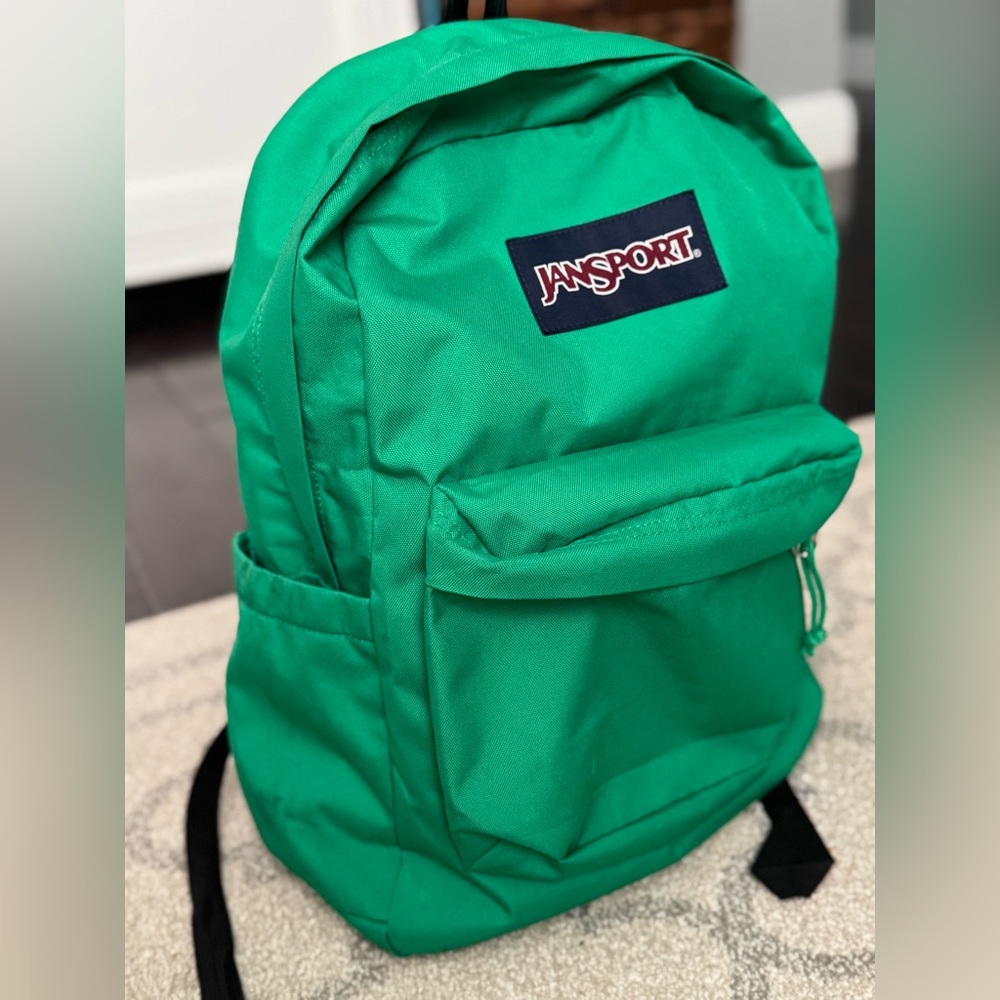 JanSport Superbreak Backpack Green
Light scuffs on side pocket